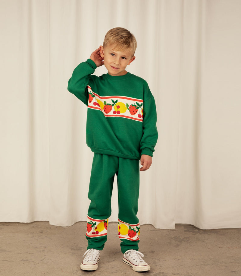 [Mini Rodini] Sweatshirt mit Früchte-Bordüre grün