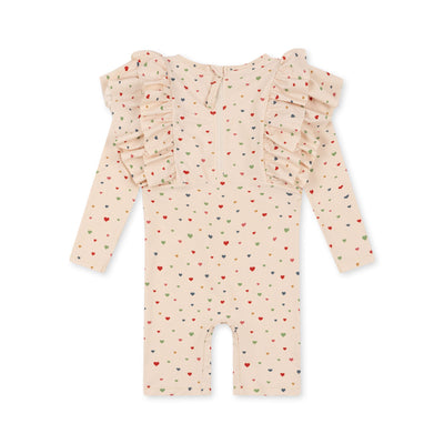 MANUCA FRILL ONESIE MULTI HEARTS