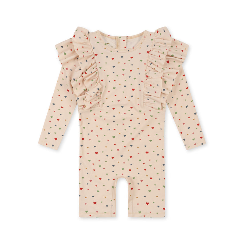 MANUCA FRILL ONESIE MULTI HEARTS